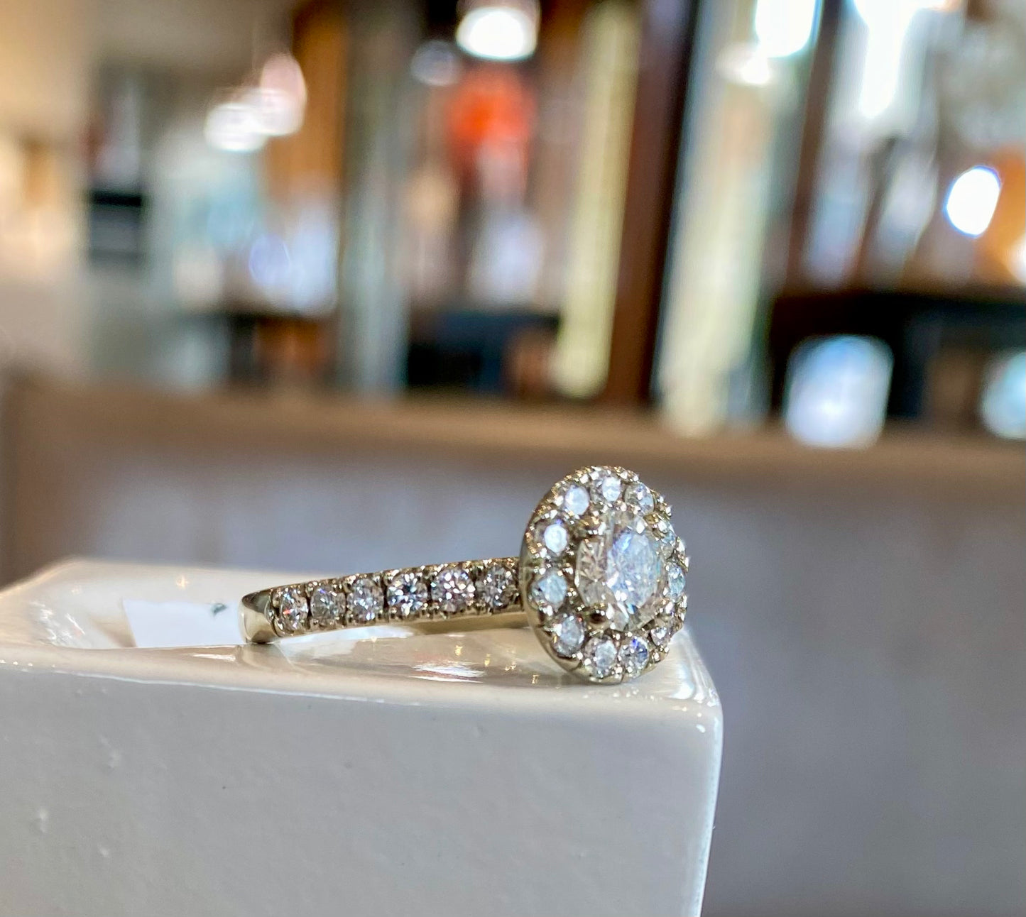 18KW Round Brilliant Diamond Ring with Diamond Halo
