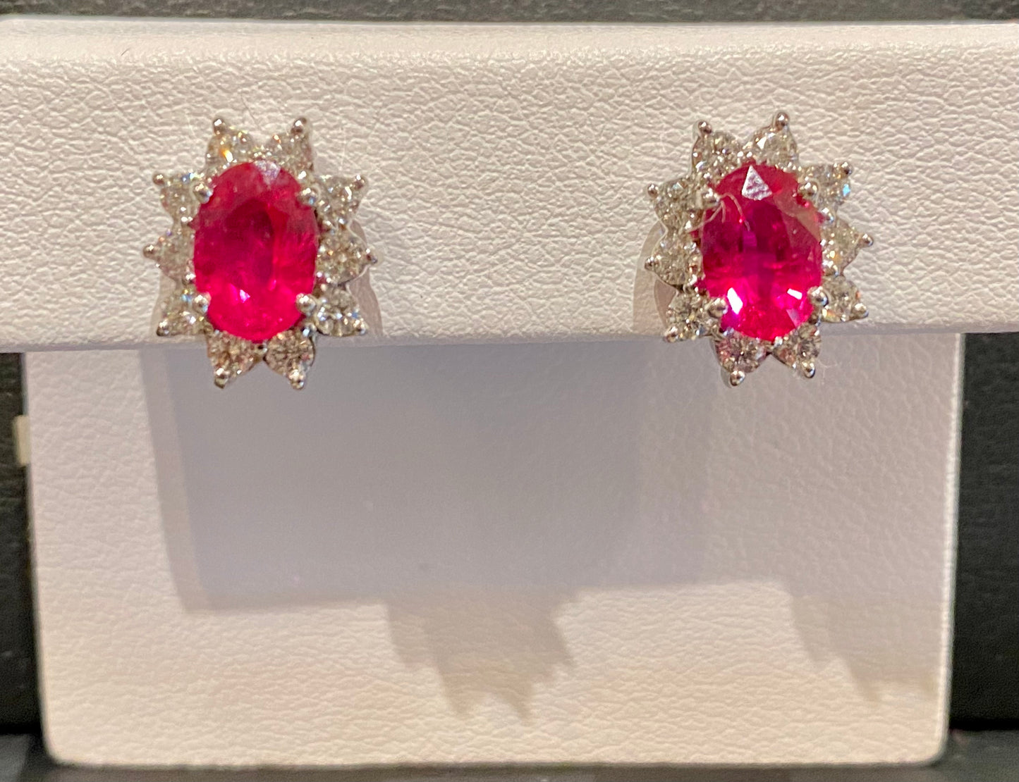 18KW OVAL RUBY AND DIAMOND HALO EARRINGS