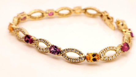 18KY RUBELLITE, GARNET, RHODOLITE, AND DIAMOND BRACELET