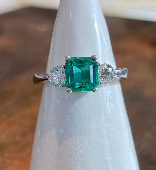 PLATINUM EMERALD AND DIAMOND RING