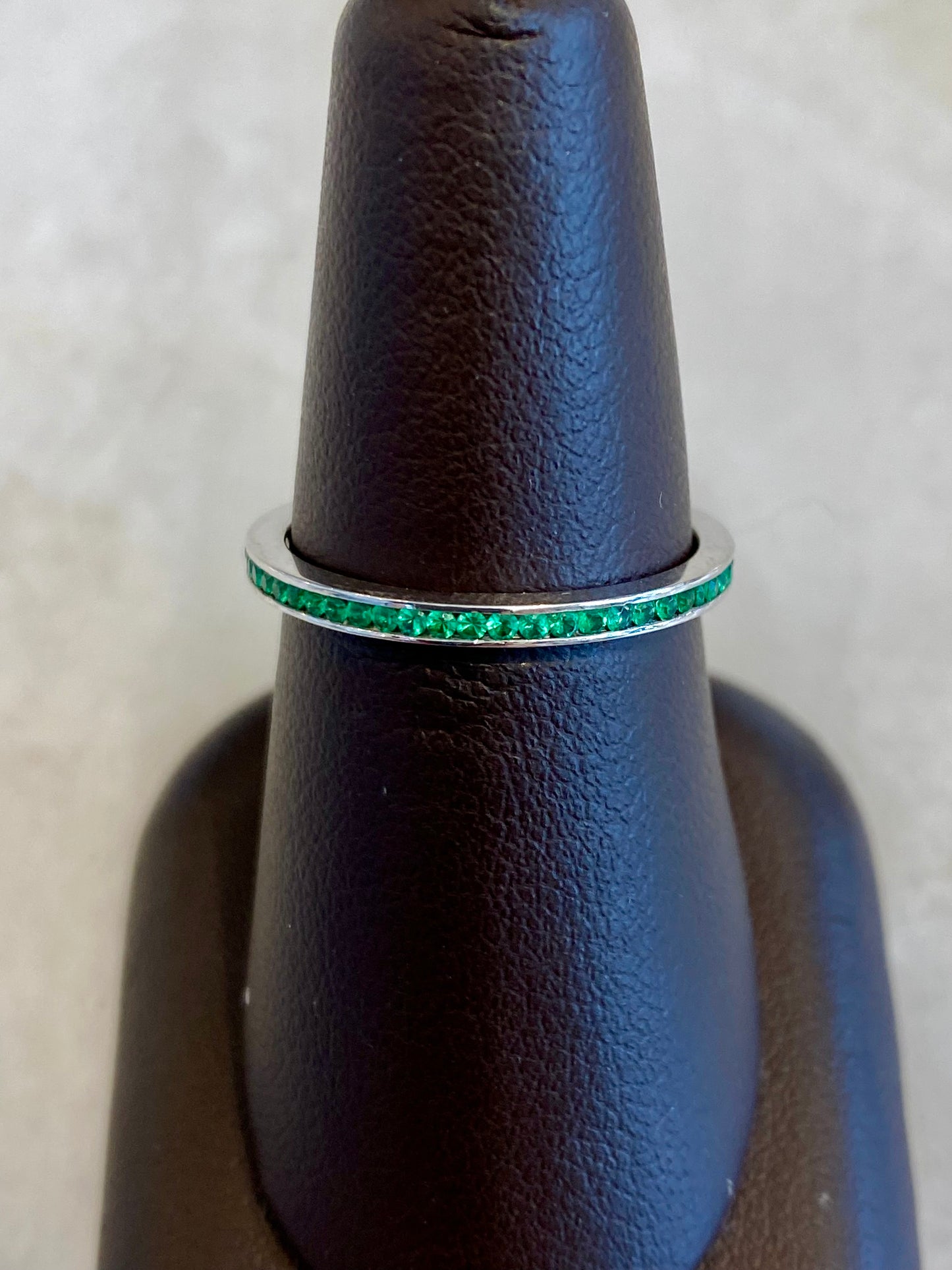 18KW Emerald Eternity Band