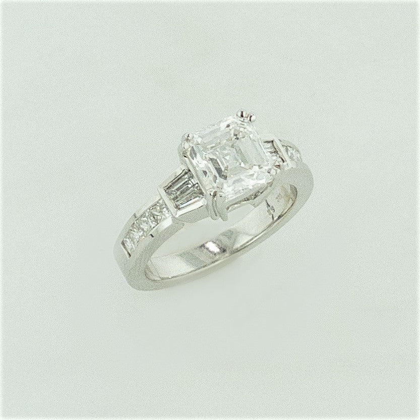 18KW Emerald Cut Diamond w/ Diamond Baguette Accents