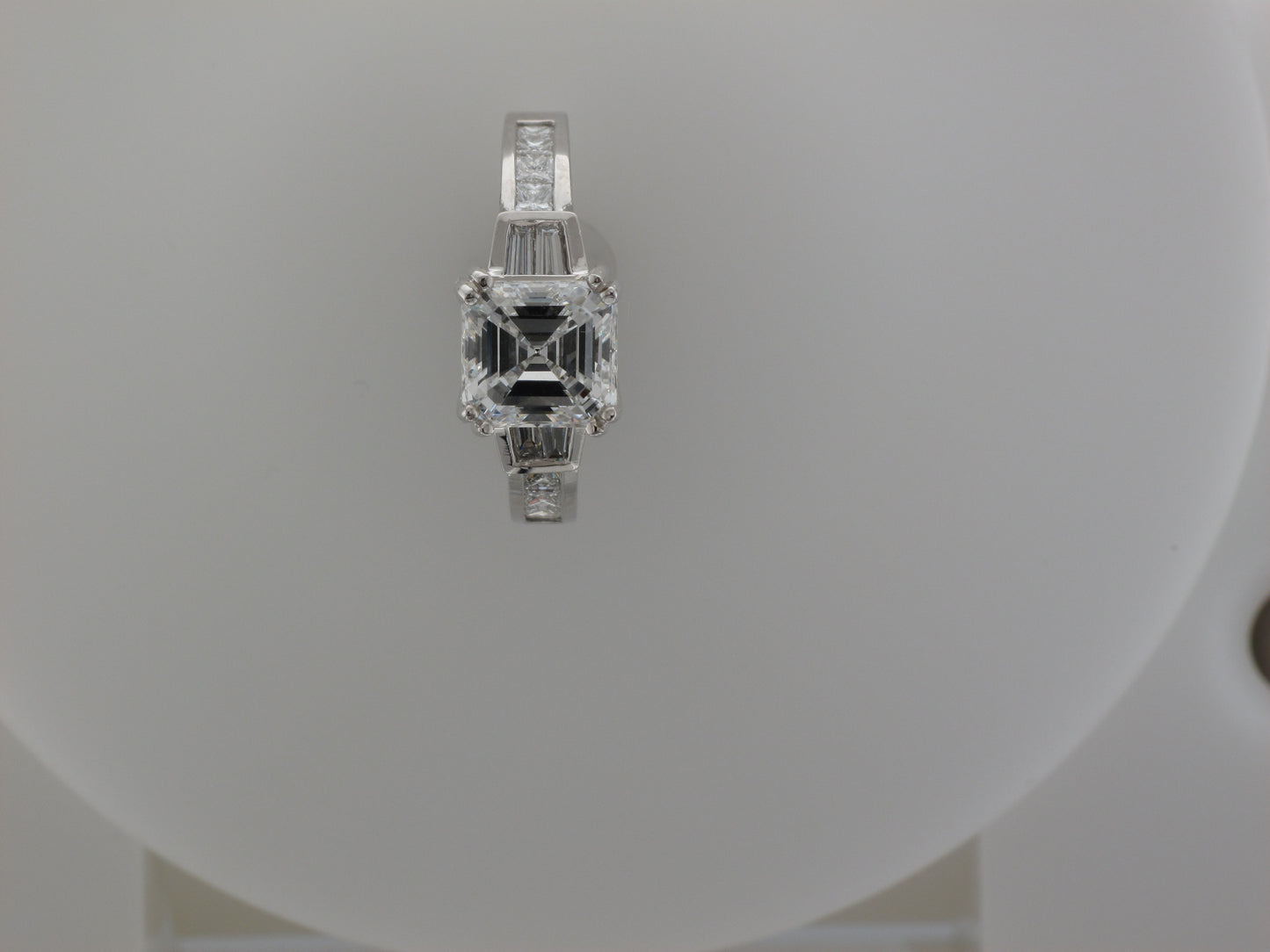 18KW Emerald Cut Diamond w/ Diamond Baguette Accents