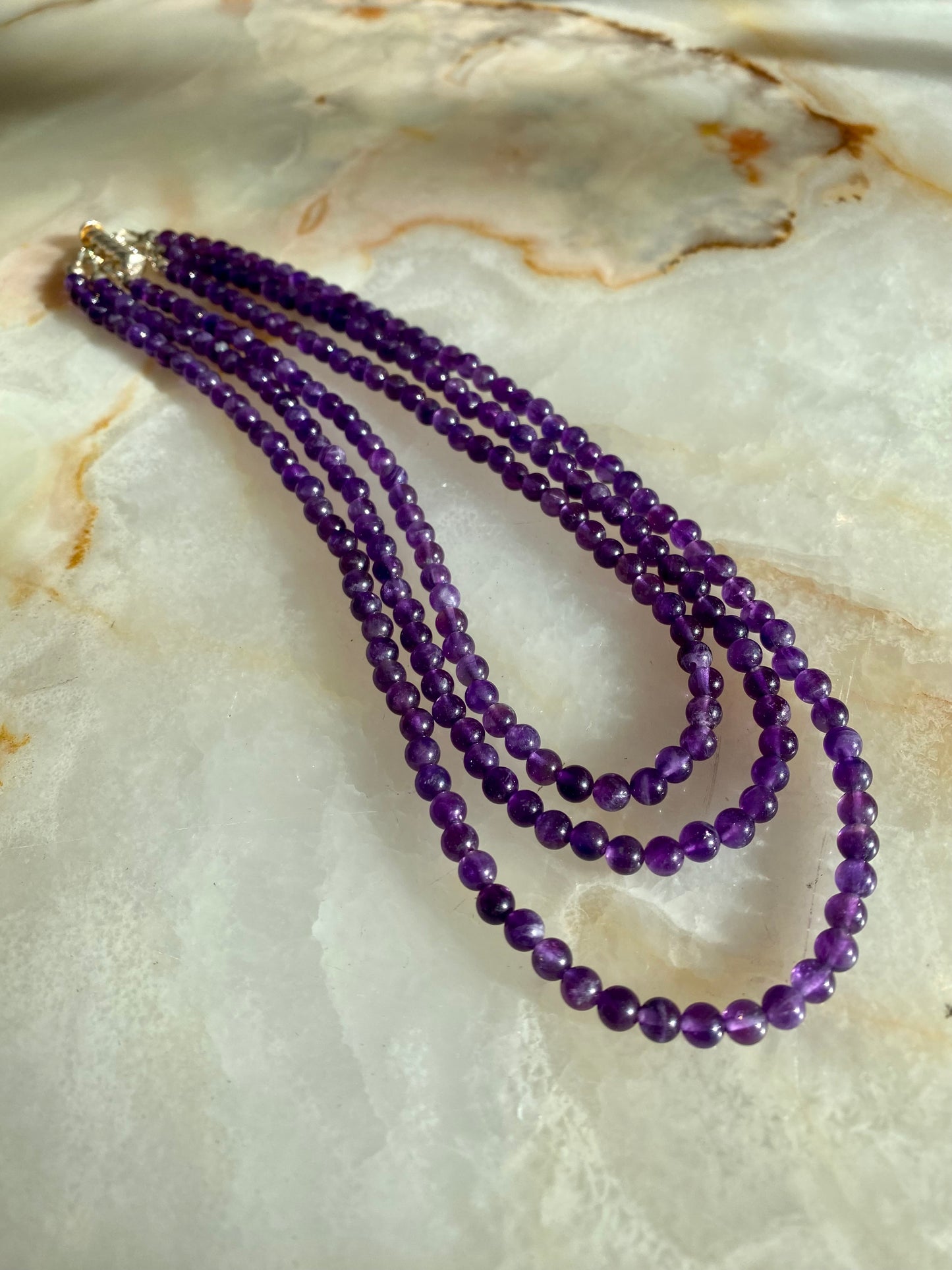 SS AMETHYST 3 STRAND BEADED NECKLACE